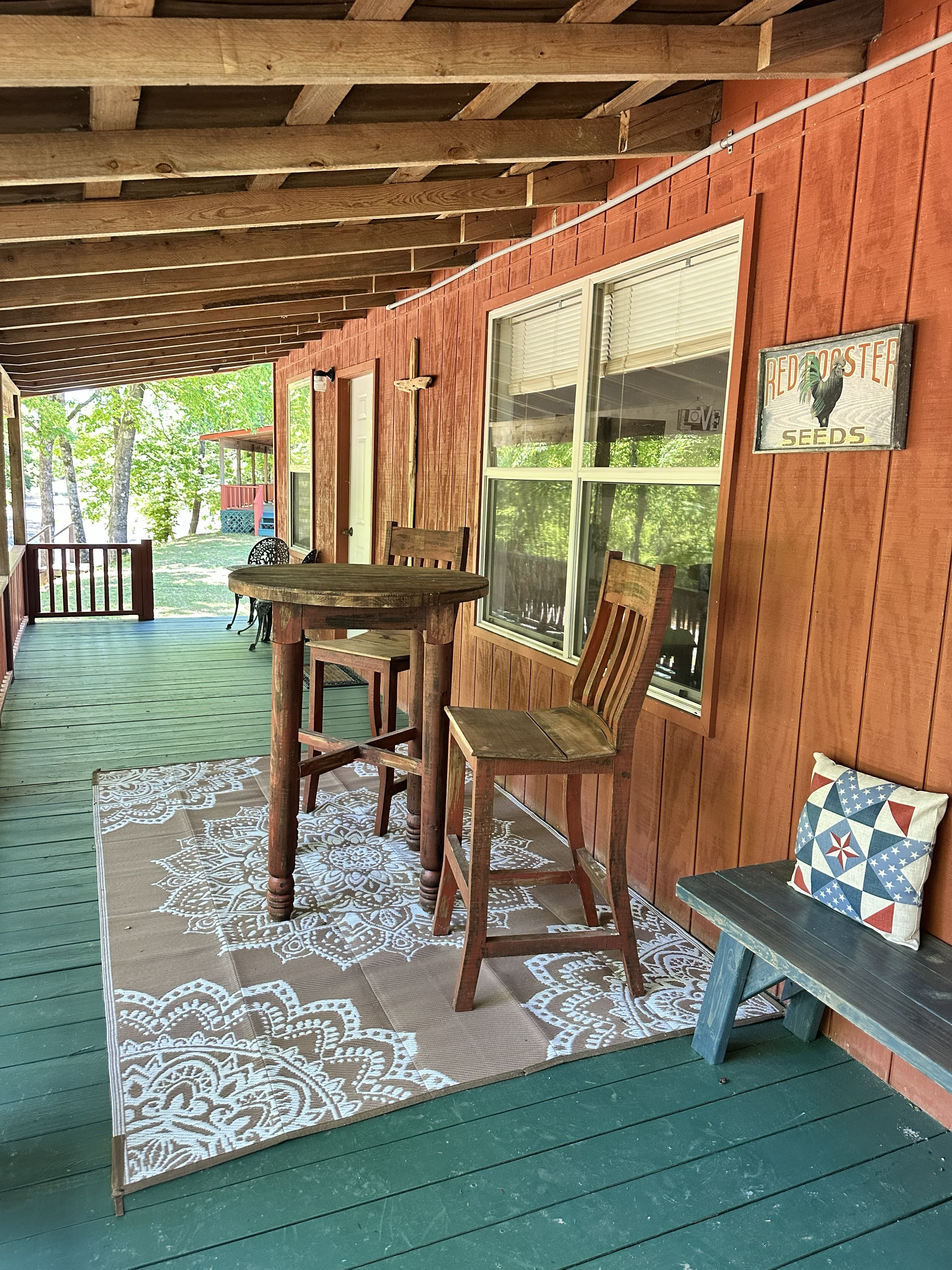 Cabin porch at At Living Water Cabins