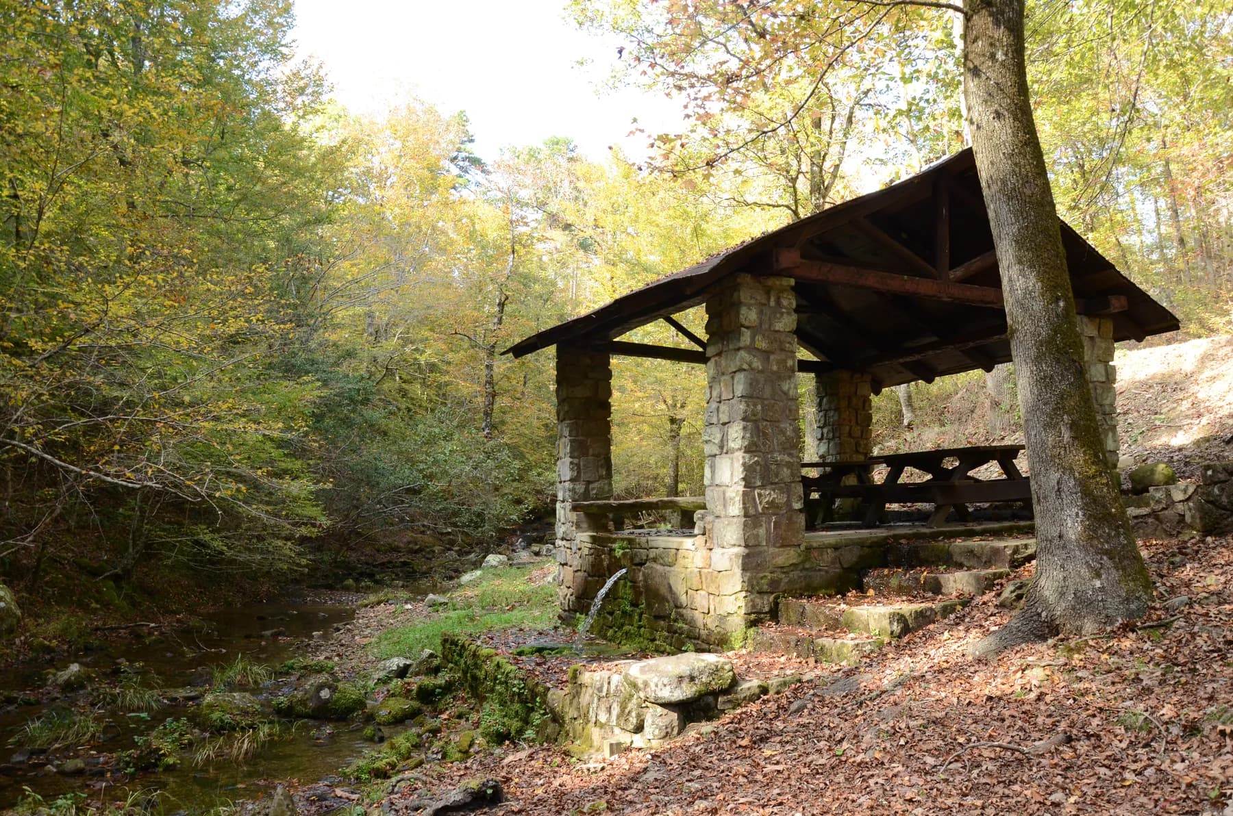 Historic stone and timber picnic shelter at Collier Springs Arkansas